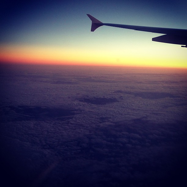 Flying high above a bed of clouds in to the Melbourne sunset. Office views...